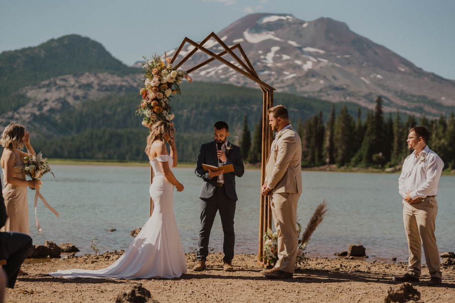 Couple eloping at Sparks Lake in Bend Oregon during Covid 